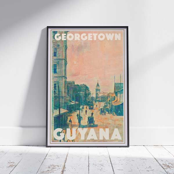 Framed Georgetown Travel Poster on a floor, showcasing the warm pastel tones and the city’s colonial street view