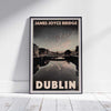 Framed James Joyce Bridge Dublin Travel Poster on a white wooden floor, highlighting the bridge and soft-focus style