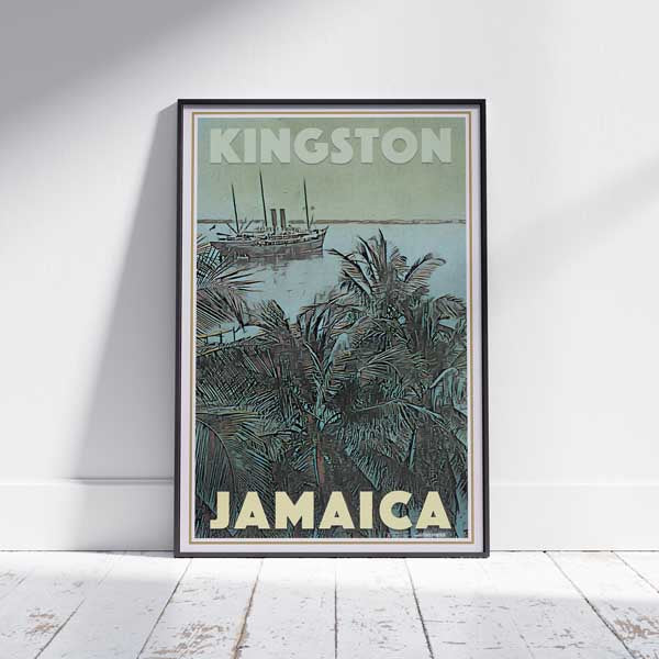 Travel poster of Kingston Jamaica in a frame on a white wooden floor