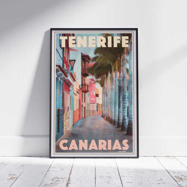 Framed Puerto de la Cruz, Tenerife Travel Poster in a bright, white-walled room – Capturing the elegance of Alecse’s limited-edition design with a view of Tenerife’s colonial streets and palm trees