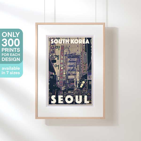 Framed Busy Seoul Poster – A framed Seoul travel poster featuring the bustling street scene of South Korea, filled with neon signs and vibrant lights. Limited edition with only 300 prints available in 7 sizes