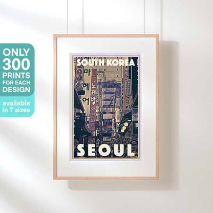Framed Busy Seoul Poster – A framed Seoul travel poster featuring the bustling street scene of South Korea, filled with neon signs and vibrant lights. Limited edition with only 300 prints available in 7 sizes