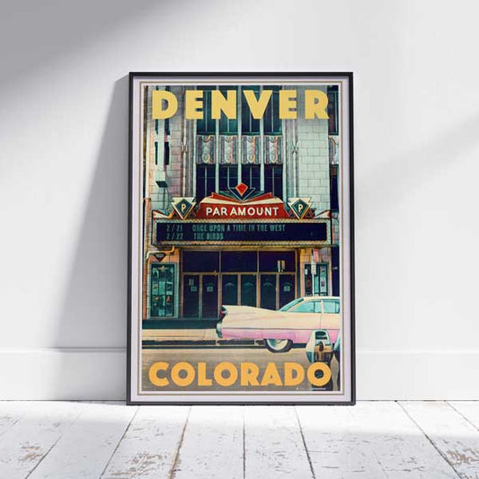 Denver Poster Paramount" framed travel poster by Alecse, depicting vintage Colorado charm on a white wooden floor