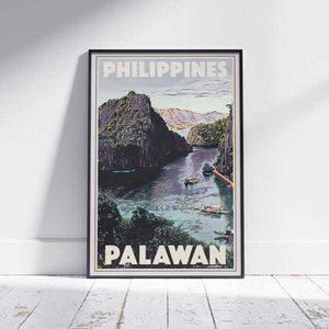 Framed travel poster of Palawan, Philippines, featuring Alecse’s vintage-style design with a view of limestone cliffs and tranquil waters
