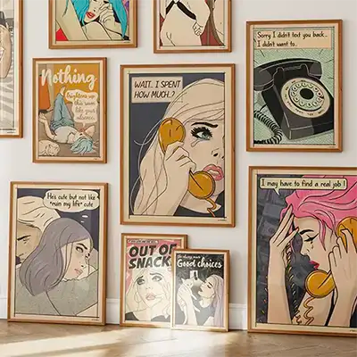 Soft Pop Studio collection of illustrated pop art posters displayed on a wall